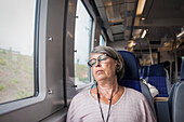Woman sleeping in train