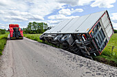 Overturned lorry on road side