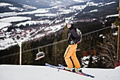 Skier at winter looking at camera