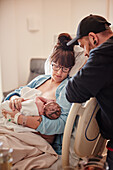 Parents in hospital with newborn baby