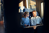 Couple in train carriage