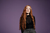 Woman looking at camera, studio shot