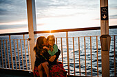Mother with daughter on ferry
