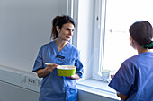 Nurses eating Asian take-out food