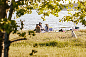 Women having picnic at lake