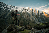 Hunter looking at mountains