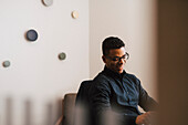 Smiling man working in office