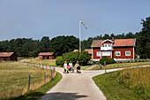 Women walking on country road