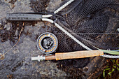 High angle view of fishing rod and fishing net