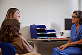 Mother and daughter having doctor appointment