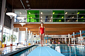 Girl on diving board