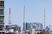 Communications towers and modern buildings in city center