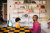 Father and daughter playing at home