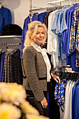 Woman in clothes shop