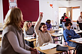 Teenagers sitting in classroom