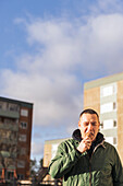 Mature man eating ice-cream