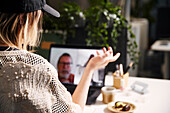 Woman using laptop in office