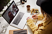 Woman using laptop in office