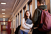 Teenagers talking at corridor