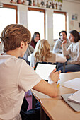 Student using tablet in class