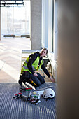 Woman working at building site