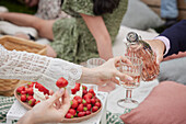 Pouring drink into wineglass