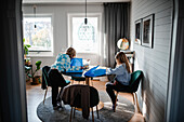 Girls sitting at table