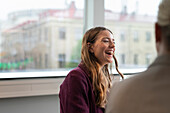 Laughing businesswoman in office