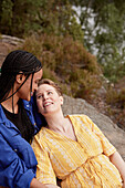 Female couple relaxing outdoors