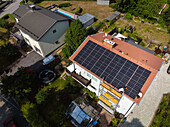 Installation of solar panels on roof of house