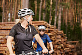 Female cyclist looking away