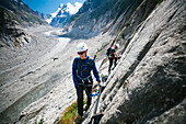 Climbers exploring mountains