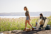 Couple sunbathing on lounge chairs