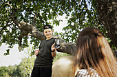 Smiling boy using cell phone