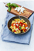 Fresh ravioli with tomato sauce