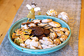 Assorted Christmas cookies in blue bowl