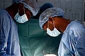 Surgeons operating