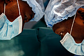 Surgeons operating