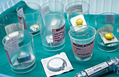 Medication sorted in glasses, conceptual image