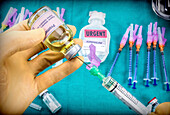 Nurse extracting medication with a syringe, conceptual image