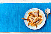 Apple pancakes with cinnamon sticks