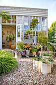 Collection of potted plants in front of the orangery