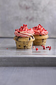 Vegan vanilla chocolate cupcakes with strawberry frosting
