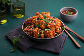 Spicy cauliflower wings with sesame seeds