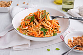 Pasta salad with cucumber and carrots in a peanut dressing