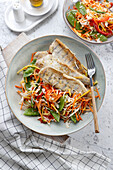 Fried zander with Asian vegetables