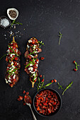 Roasted stuffed eggplant with grilled beef, beetroot chutney and feta