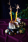 Christmas ice-cream bombe with sparklers, sliced