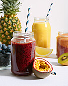 Tuttifrutti smoothies with blueberries, blackberries and passion fruit