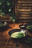 Cream of pea soup with basil